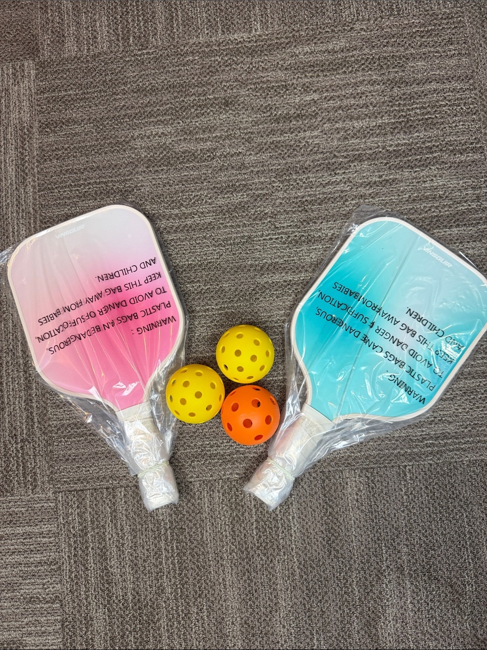 Two-Paddle Outdoor Pickleball Set with Pink & Teal Paddles and Black Carry Bag